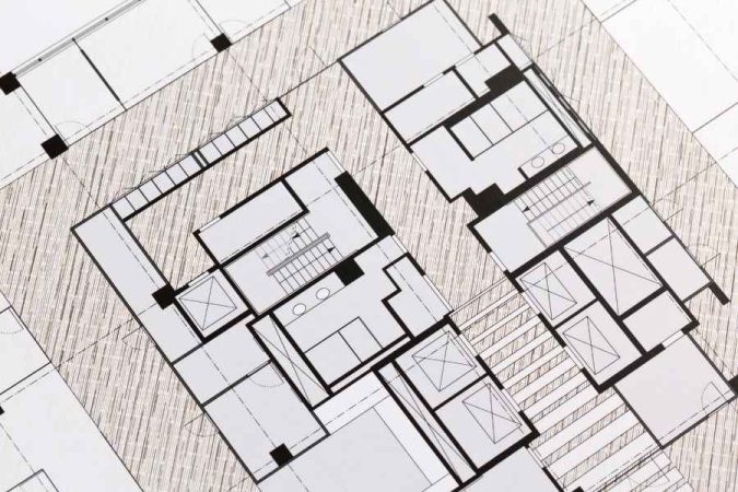 Vue de dessus détaillée d'un plan d'architecte imprimé en noir et blanc.